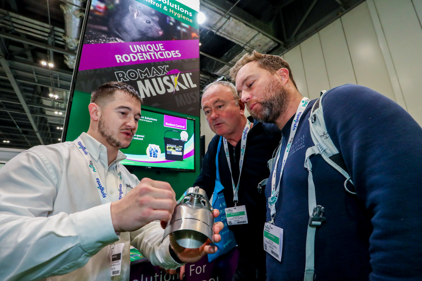 PestEx exhibitors showing of their pest prevention products to some UK vistors